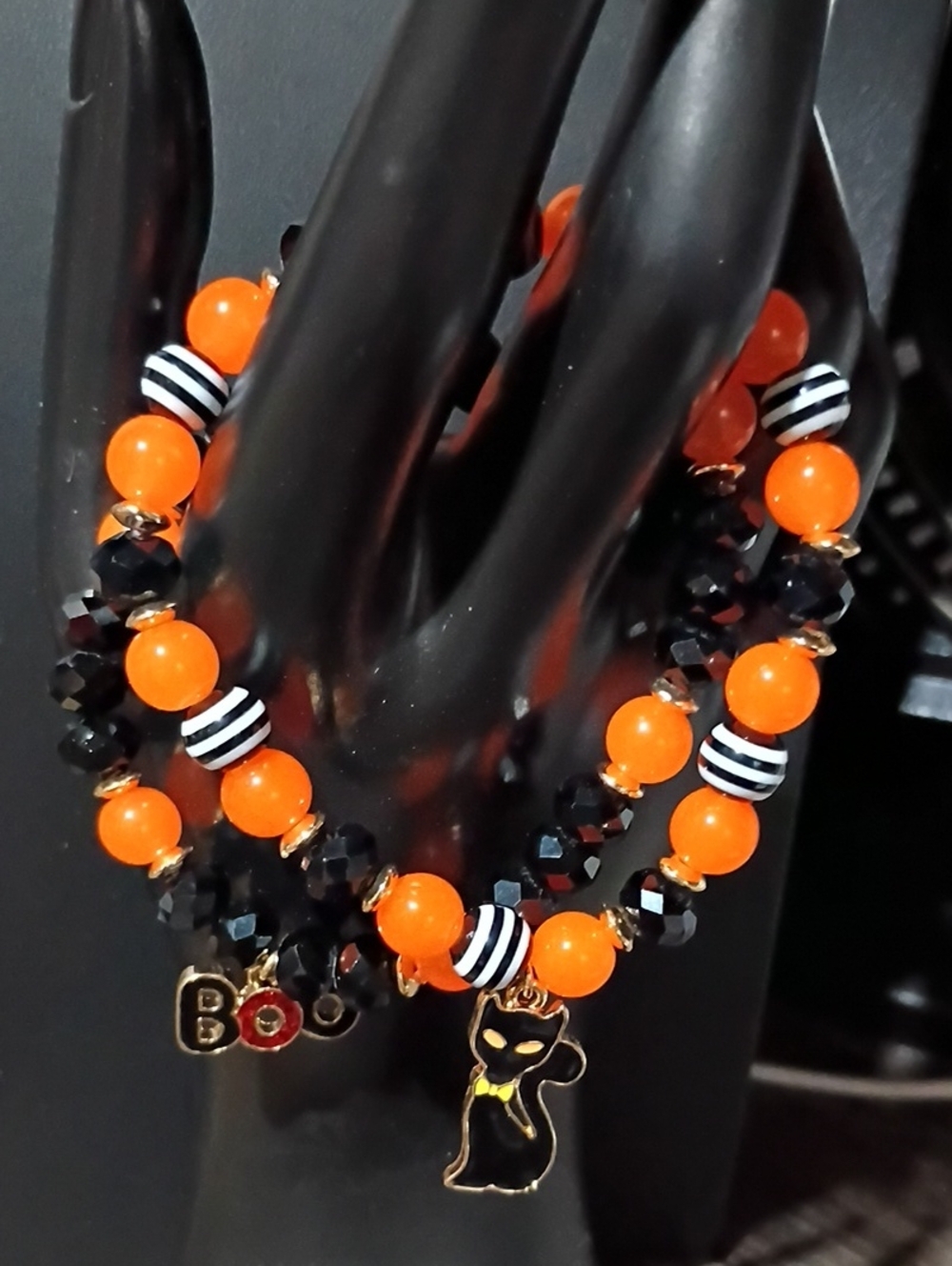 Festive Orange & Black Beaded Charm Bracelet with Playful Cat Accent